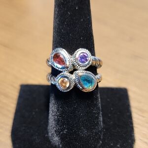 Red and Purple Gemstone Ring with Artistic Silver Design